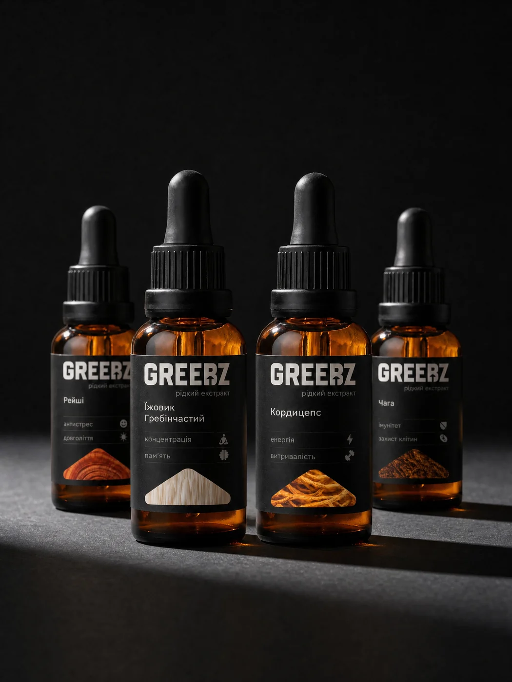 Чотири флакони GREEBZ 30 мл: їжовик, кордицепс, рейші й чага на темному сланці